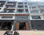 Nhà khu đồng bộ cao tầng, hẻm nhựa 10m thông có vỉa hè mỗi bên 2m.